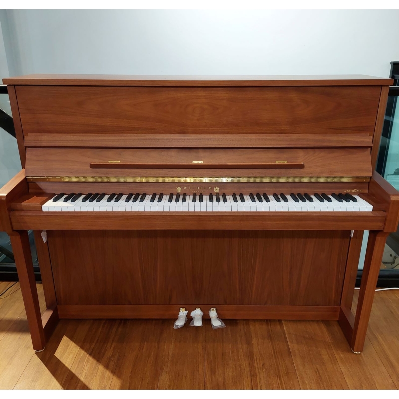 Light wood shop upright piano